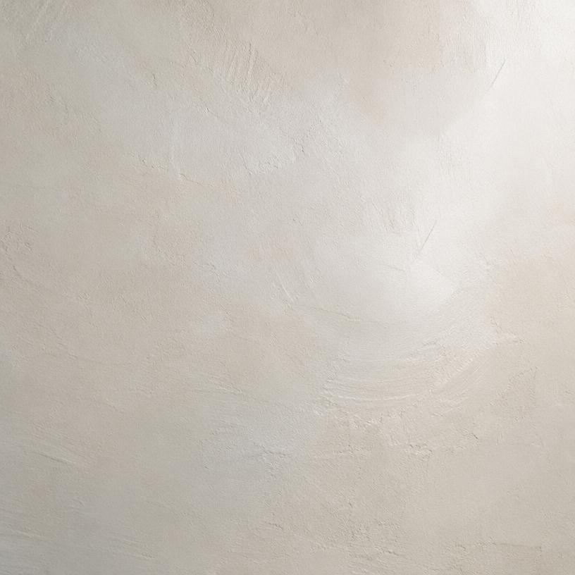 Close-up of smooth-finish warm white stucco